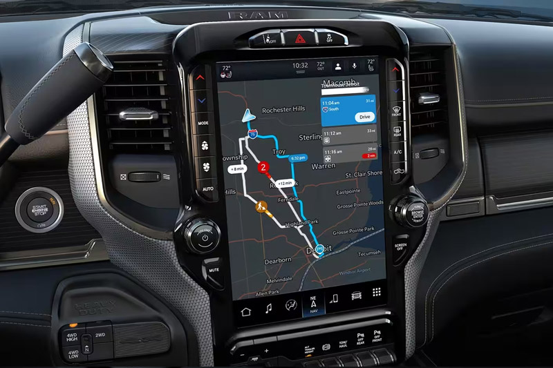 A close-up of the Uconnect touchscreen in the 2023 Ram 2500 Limited, displaying a navigation map